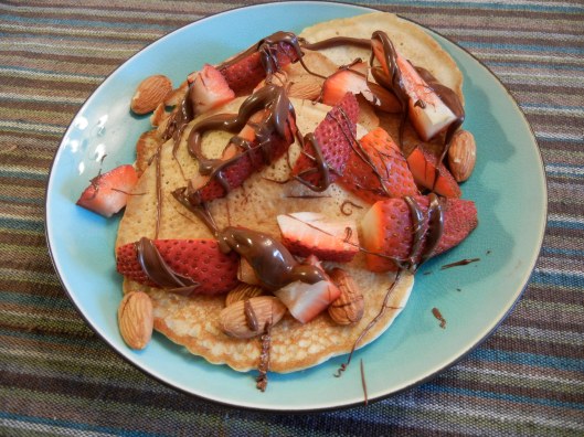 Strawberry Almond Pancakes with Nutella Drizzle